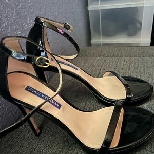 Shiny Black -Patent Leather 7.5 Heels. Slightly worn still in good condition.